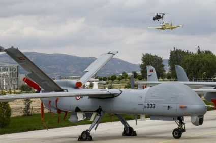Helicopter Atak, Plane Hurkus and drone Anka, designed and upgraded by Turkish Aerospace Industries, perform during Malaysian Prime Minister Mahathir Mohamad's visit to Ankara, Turkey on 25 July 2019.