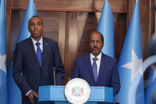Somalia's President Hassan Sheikh Mohamud (right) and newly appointed Prime Minister Hamza Abdi Barre, in Mogadishu, 15 June 2022.