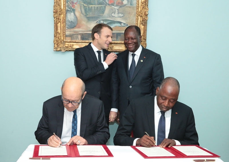 Macron and Ouattara attended the signing of an AFD aid package.