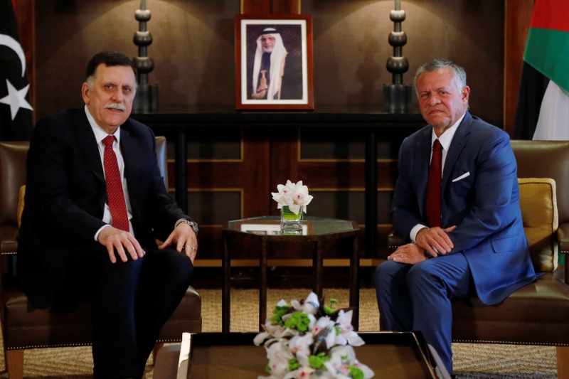 Jordan's King Abdullah II (R) meets with Fayez al-Sarraj, Libya's Prime Minister.