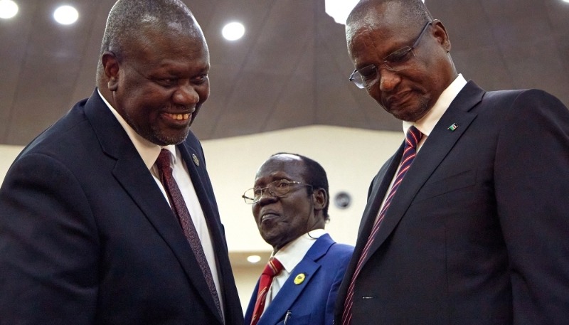 From left, South Sudan's First Vice President Riek Machar, Second Vice President James Wani Igga and Third Vice President Taban Deng Ga, attend their swearing in ceremony in Juba, South Sudan on 22 February 2020.