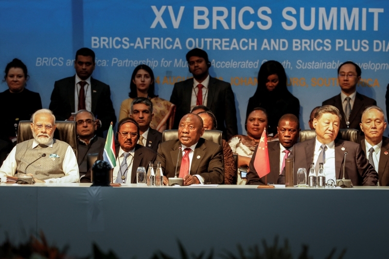 Prime Minister of India Narendra Modi, South African president Cyril Ramaphosa and president of China Xi Jinping attend a meeting during the 2023 BRICS Summit at the Sandton Convention Centre in Johannesburg on 24 August 2023. 
