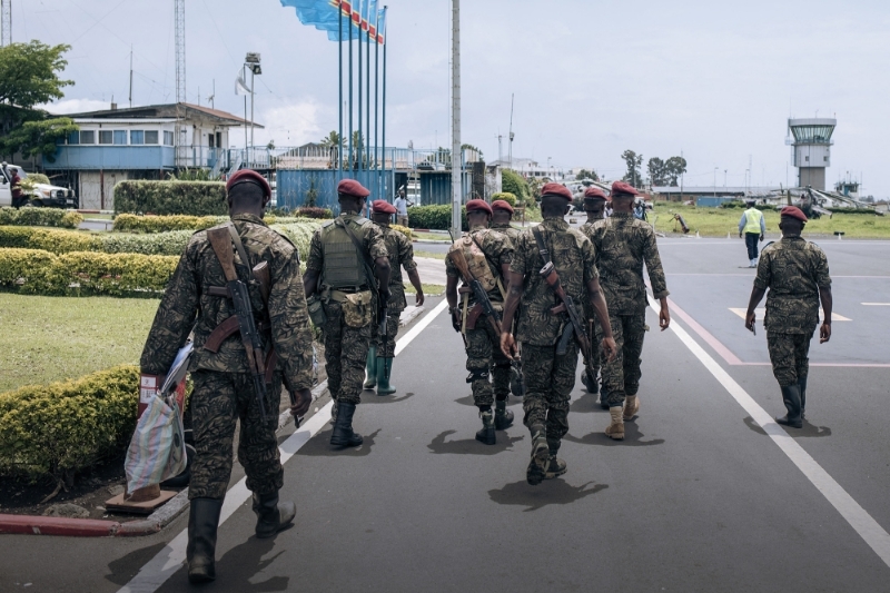 Soldiers of the Congolese Republican Guard walk on the tarmac of the airport in Goma, eastern Democratic Republic of Congo, on 12 November 2022.