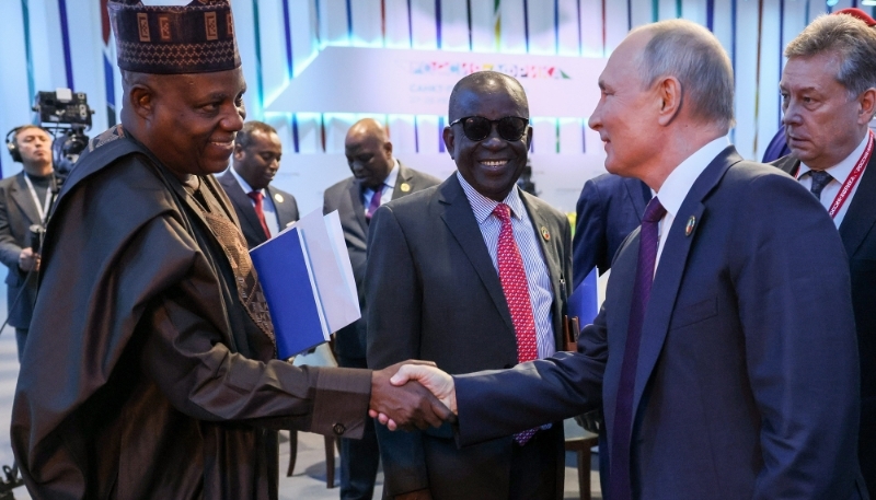 Nigeria's Vice-President Kashim Shettima shaking hands with Russia's President Vladimir Putin during the second Russia-Africa Economic and Humanitarian Forum in St Petersburg, Russia, 28 July 2023. 