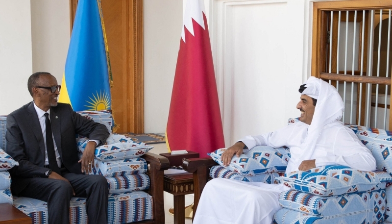 Rwanda's President Paul Kagame is welcomed by Emir of Qatar Sheikh Tamim Bin Hamad Al Thani in Doha, Qatar, on 21 March 2023.