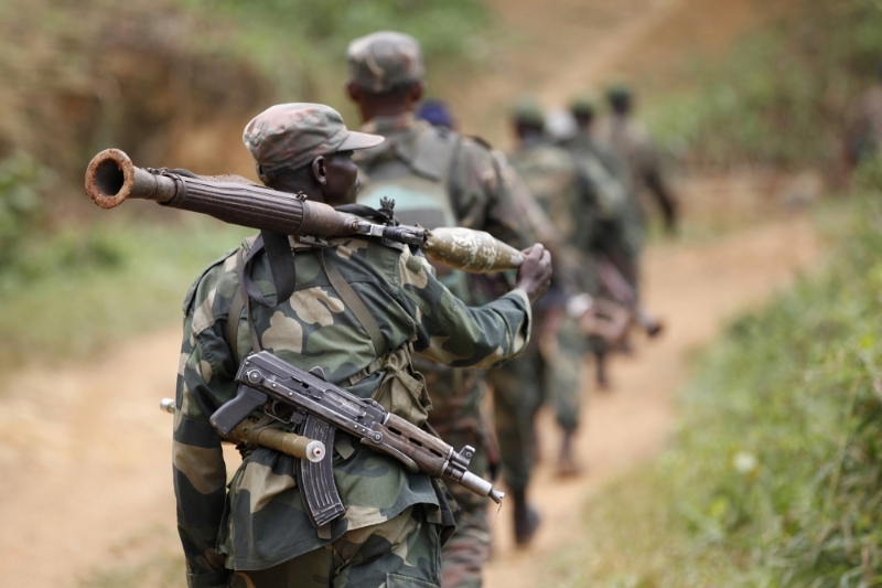 Democratic Republic of Congo military personnel (FARDC) patrol against the Allied Democratic Forces (ADF) and the National Army for the Liberation of Uganda (NALU) rebels near Beni in North-Kivu province, December 31, 2013.