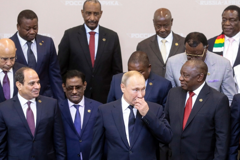 Russia's president Vladimir Putin stands next to Egypt's president Abdel Fattah al-Sisi and South African president Cyril Ramaphosa during the Africa-Russia summit 2019 in Sochi.