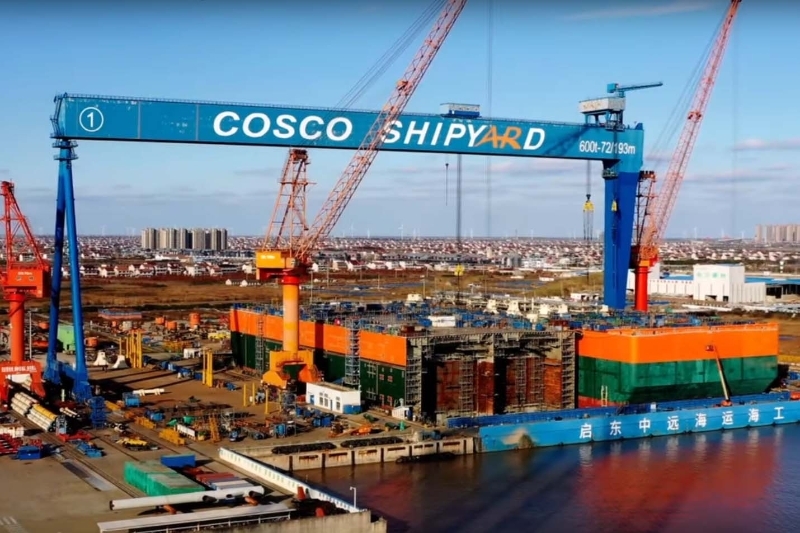 The Cosco shipyard, in China, where BP's floating production storage and offloading platform for the Grand Tortue Ahmeyim field is built (right).