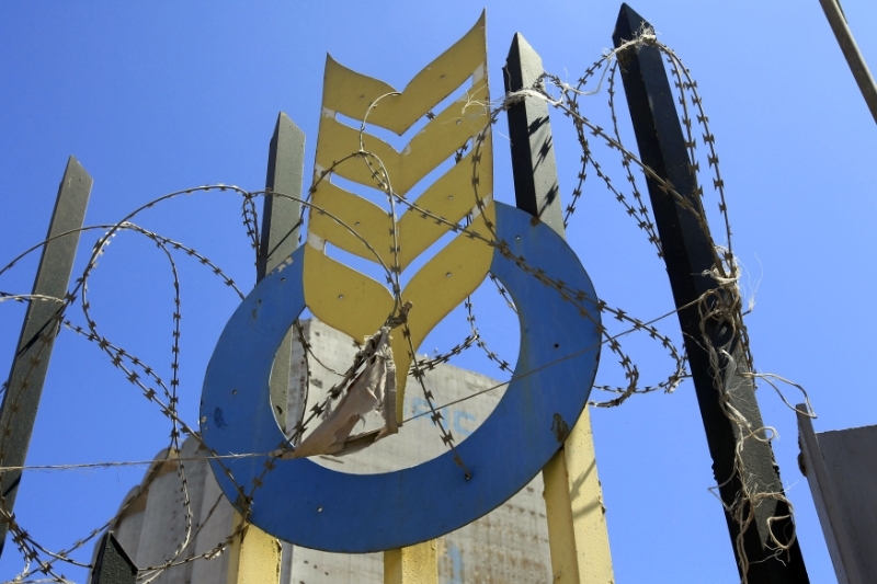 The logo of the Office algérien interprofessionnel des céréales (OAIC) on a silo in the port of Algiers.