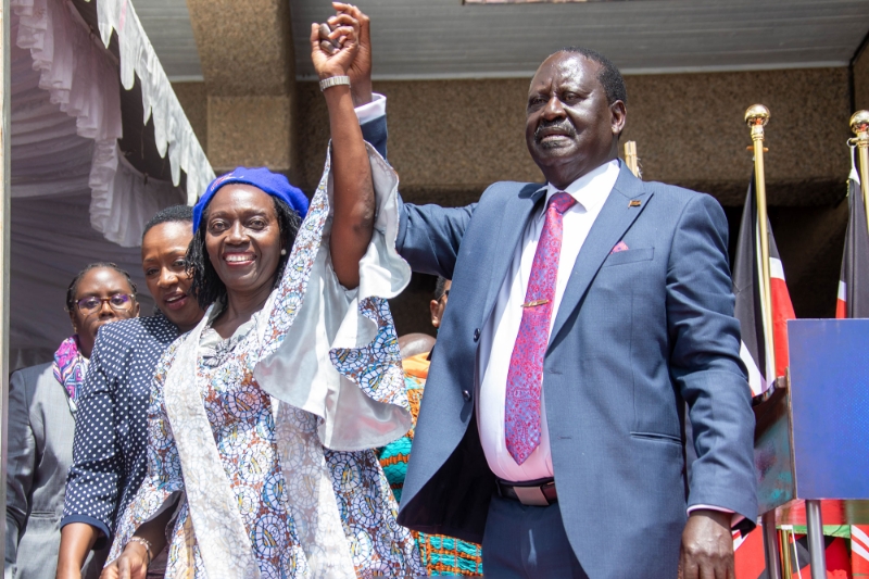 Presidential candidate Raila Odinga (R) and his running mate Martha Karua.