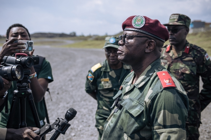 General Emmanuel Kaputa, deputy chief of staff from the East African Community (EAC) regional force, answers journalists during the arrival of Burundian troops at Goma airport in eastern Democratic Republic of Congo on 5 March 2023.