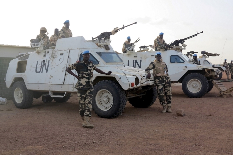 Chadian peacekeepers stand guard at the Minusma peacekeeping base in Kidal, Mali, July 22, 2015. REUTERS/Adama Diarra