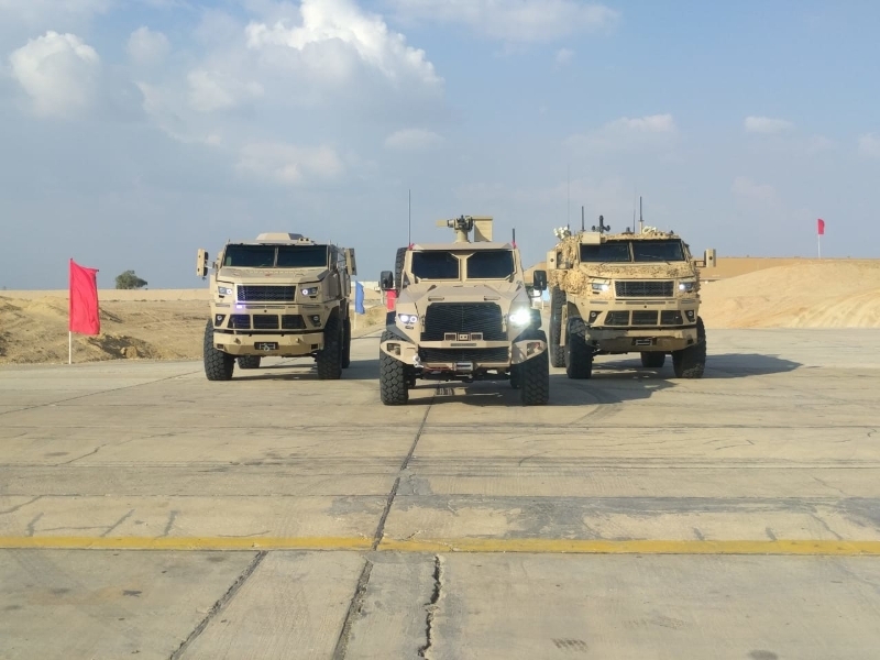 The armoured vehicles IMUT ST-500 (centre) and ST-100 (left and right).