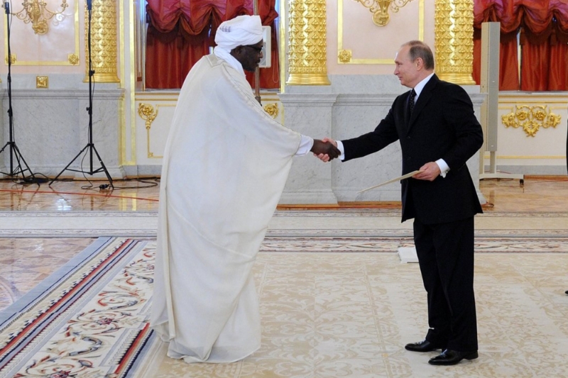 Vladimir Putin receives credentials from Sudan ambassador to Russia, Nadir Babiker, in 2015.
