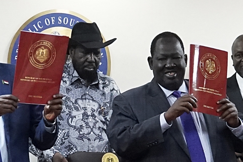 South Sudanese president Salva Kiir (left) and his security adviser Tut Gatluak Manime.