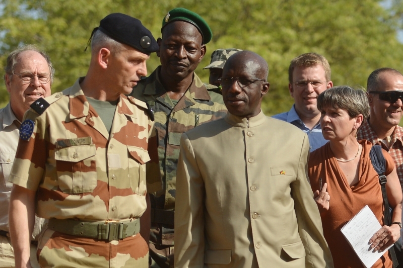 Yamoussa Camara, then secretary of defence, stands with François Lecointre, commander of the European Union Training Mission in Mali (EUTM Mali) on 18 March 2013.
