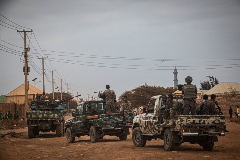 African Union Mission to Somalia (AMISOM) troops patrol the streets of Baidoa, in southwestern Somalia, on 3 September 2022.