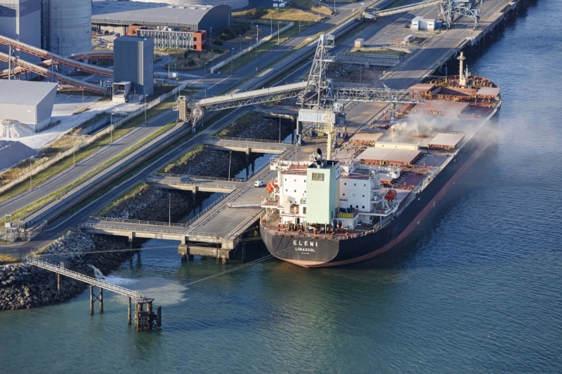 A grain ship being loaded in the port of La Rochelle, France.