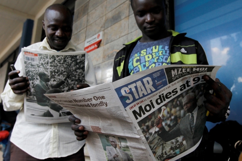 Kenyans read an edition of The Star, a daily newspaper owned by Radio Africa Group (RAG), on 4 February 2020 in Nairobi.