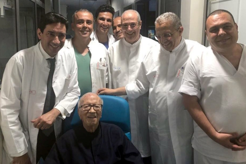 Tunisian President Beji Caid Essebsi is pictured surrounded by medical staff members in Tunis.