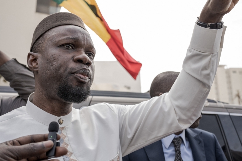 Senegal's opposition leader and presidential candidate Ousmane Sonko addresses his supporters as he went to court to attend the hearing, on 16 March 2023 in Dakar, Senegal.