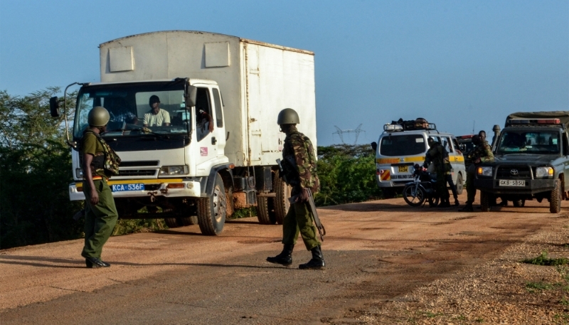 Kenyan police officers check vehicles in the coastal region of Lamu on 2 January 2020.