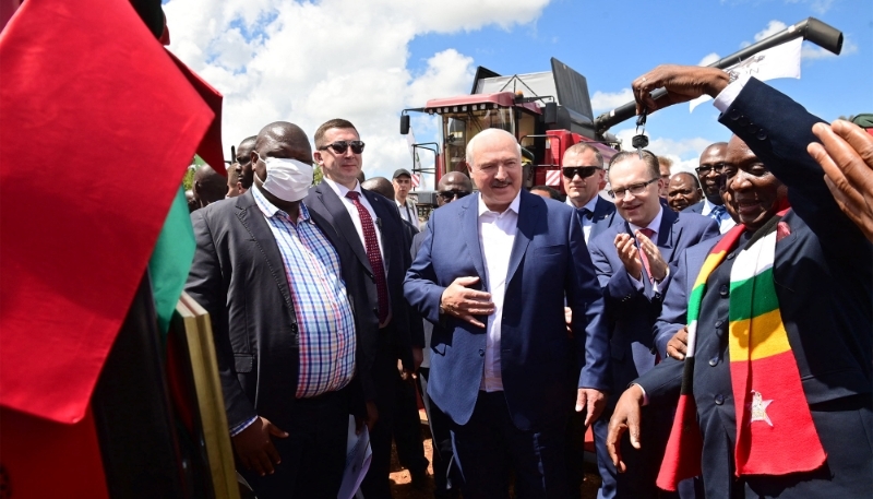 Belarusian President Alexander Lukashenko and his Zimbabwean counterpart Emmerson Mnangagwa at a ceremony to hand over Belarusian agricultural machinery in Harare on 31 January 2023.