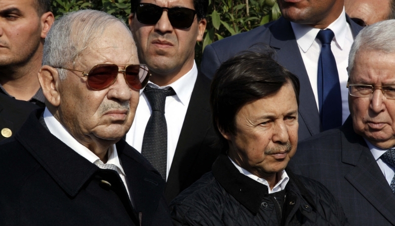 Said Bouteflika (C) with Gaid Salah (L) at General Mohamed Atailia's burial in Algiers, Algeria, 10 December 2017.