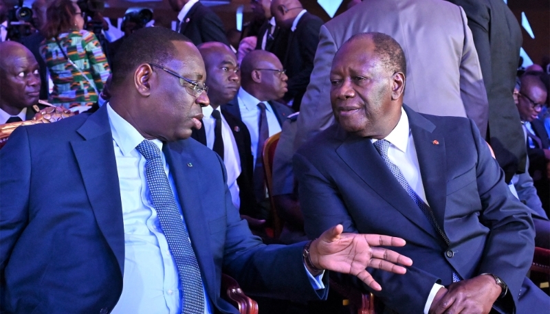 Senegalese president Macky Sall and his Ivorian counterpart Alassane Ouattara in Abidjan on 14 June 2022.