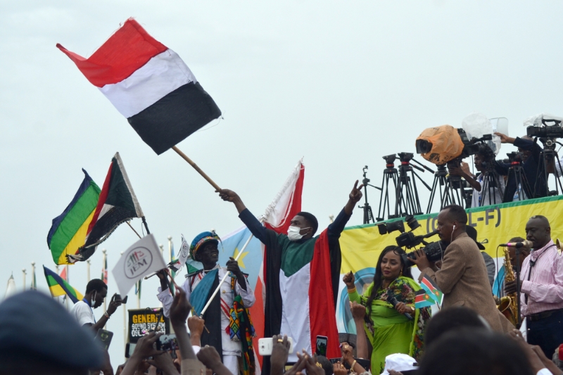 People celebrate after the signing of the Juba agreement on October 3, 2020.