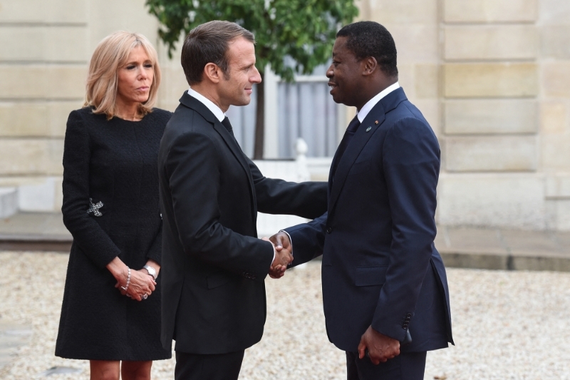 Togolese President Faure Gnassingbé at the Elysee Palace in 2019 with his counterpart Emmanuel Macron and his wife Brigitte Macron.