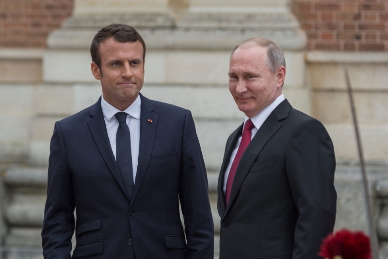 Emmanuel Macron receives Vladimir Putin, the Russian president, at the Palace of Versailles.