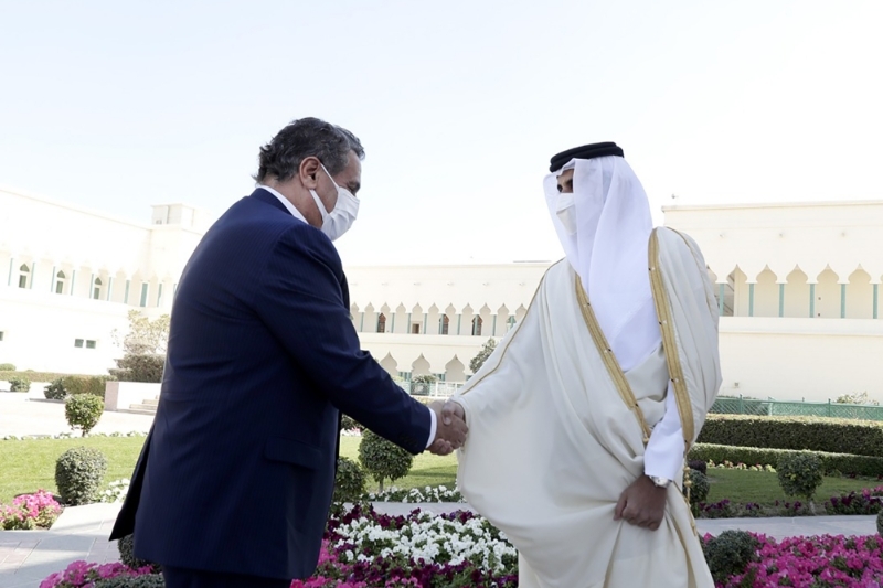 Morocco's PM Aziz Akhannouch and Qatar's emir Sheik Tamim Bin Hamad Al-Thani in Doha, February 2022.