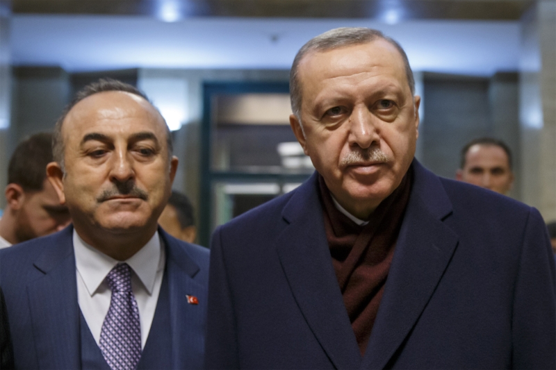 Turkey's President Recep Tayyip Erdogan (right) Foreign Minister Mevlut Cavusoglu.