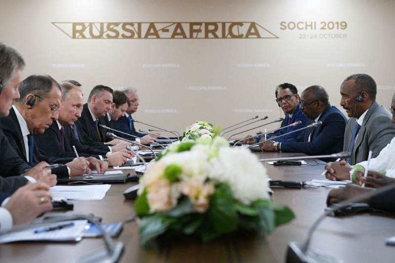 Russian president Vladimir Putin and leader of Sudan's transitional council Abdel Fattah Al-Abdelrahman Burhan attend a meeting at the 2019 Russia-Africa Summit in Sochi, Russia.
