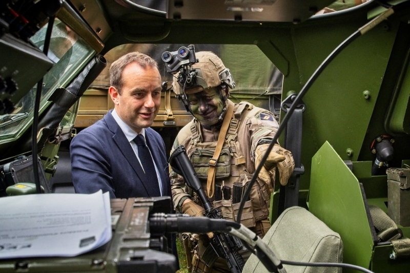 French Defence Minister Sebastien Lecornu looks at a VBL (Light Armor Vehicle) in Poitiers, France, 9 June 2022.