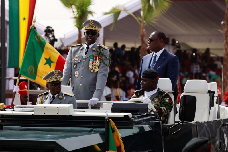Senegal's president Macky Sall and army chief of staff, General Cheikh Wade, during a military parade in Dakar on 4 April 2023.