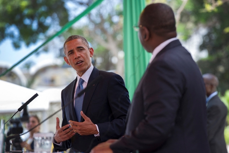 US President Barack Obama talks with the Senegalese president Macky Sall during a bilateral press conference at the Presidential Palace in Dakar, Senegal, on 27 June 2013.