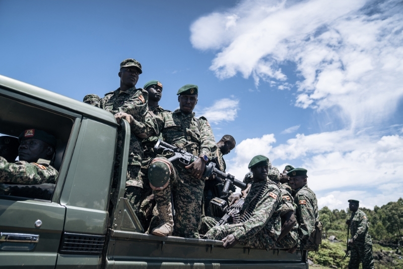 Ugandan soldiers from the East African Community Regional Force (EACRF) patrol near one of their bases in Bunagana, Democratic Republic of Congo, on 19 April 2023.
