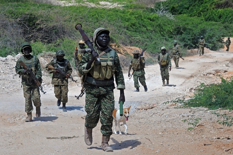 Uganda's troops, part of the African Union's military mission, patrol near the town of Merka, 90km south of Somalia's capital Mogadishu, on 17 July 2016.