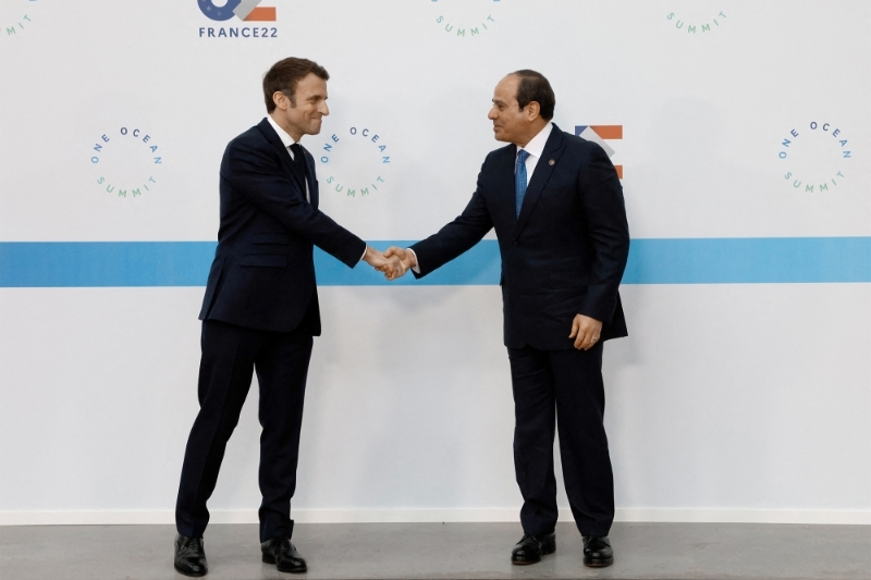 France's President Emmanuel Macron with Egypt's President Abdel Fattah el-Sissi in Brest, France, 11 February 2022.