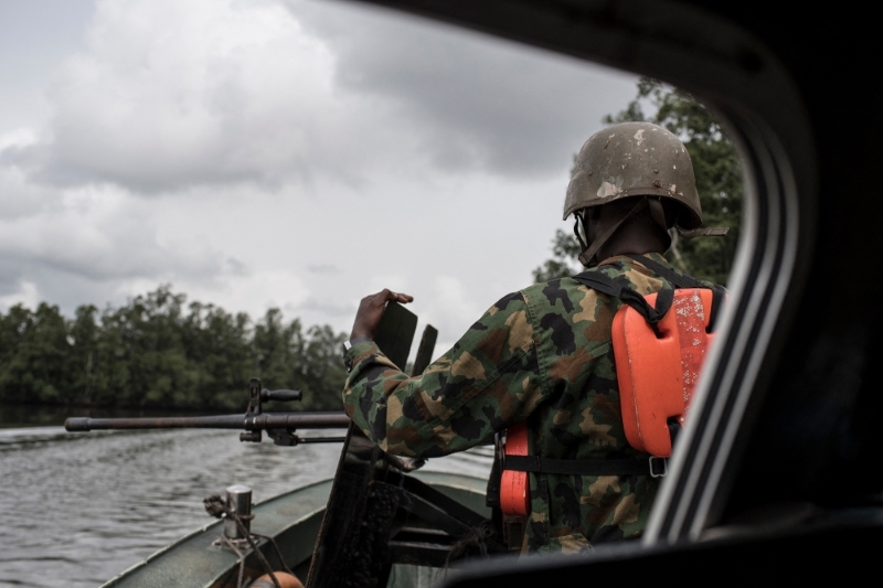 A member of NNS Pathfinder of the Nigerian Navy forces in the Niger Delta region near the city of Warri, 19 April 2017.