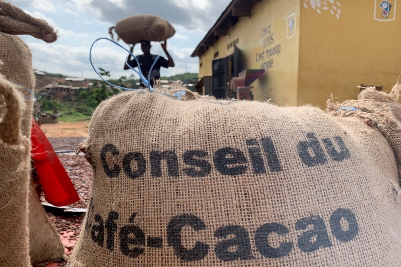 A bag of cocoa beans stamped "Conseil du café-cacao" in Ivory Coast.