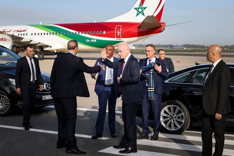 President of the Royal Moroccan Football Federation Fouzi Lekjaa receives the president of the International Football Federation (FIFA), Gianni Infantino, and the Confederation of African Football (CAF) President Patrice Motsepe, upon their arrival at the Sale airport, ahead of the FIFA Club World Cup draw, on 13 January 2023.