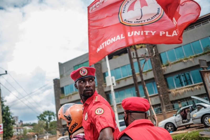 Security members ride on a motorcycle before the arrival of Ugandan singer turned politician Robert Kyagulanyi aka Bobi Wine as he becomes President of his new political party National Unity Platform (NUP) near NUP headquaters in Kampala, Uganda, on August 21, 2020.