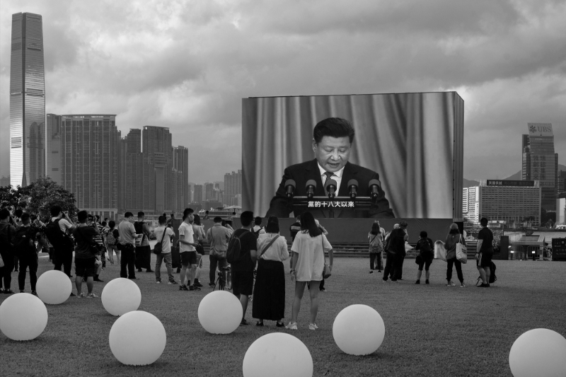 A screen displays footage video of Chinese President of the People's Republic Chinese president, Xi Jinping, in Hong Kong on July 1, 2021. It was celebrating its 24th anniversary of the handover to China.